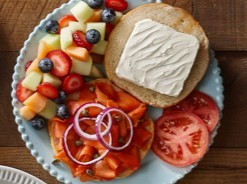 Bagel cream cheese smoked salmon onion, capers, tomatoes and fruits